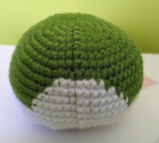 Completed Sommie head as seen from behind. There is a seam along the center of the back of the head.