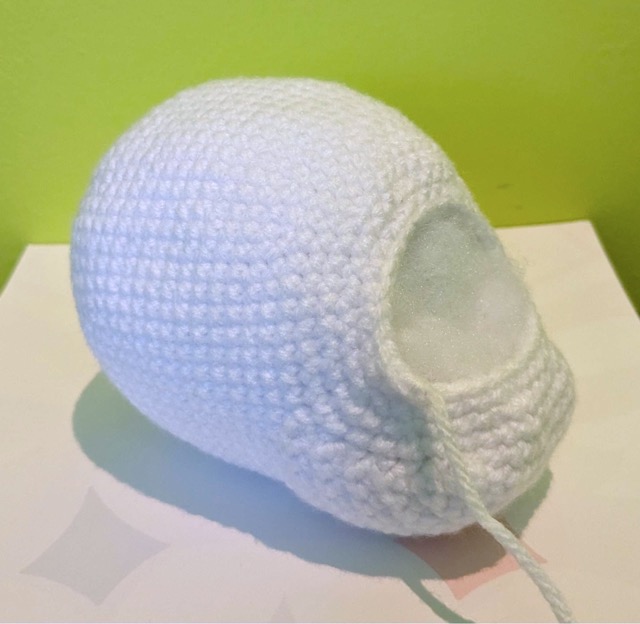 Completed Sommie body, viewed from the front on a diagonal. The body is stuffed.
